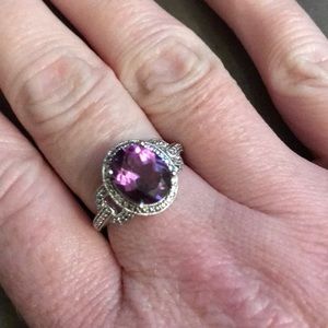 Never worn sterling silver ring. Stamped SAI.